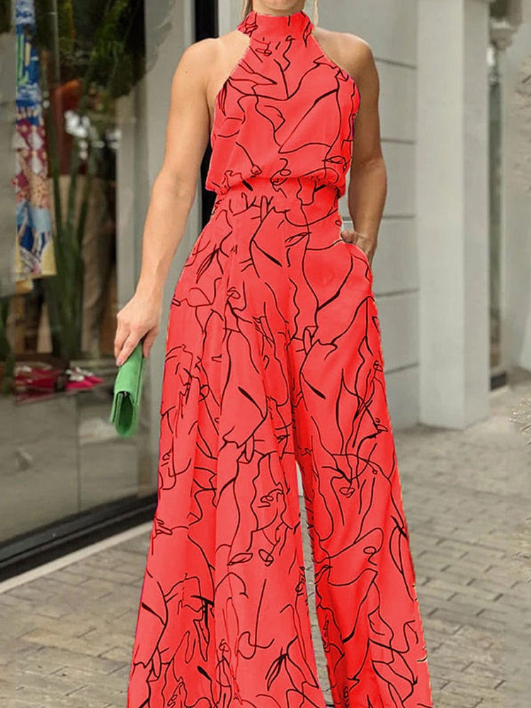 Sleeveless Hanging Neck Pants Print Jumpsuits - JELESACK