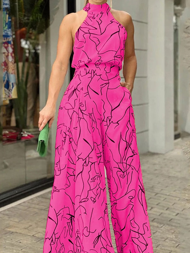 Sleeveless Hanging Neck Pants Print Jumpsuits - JELESACK