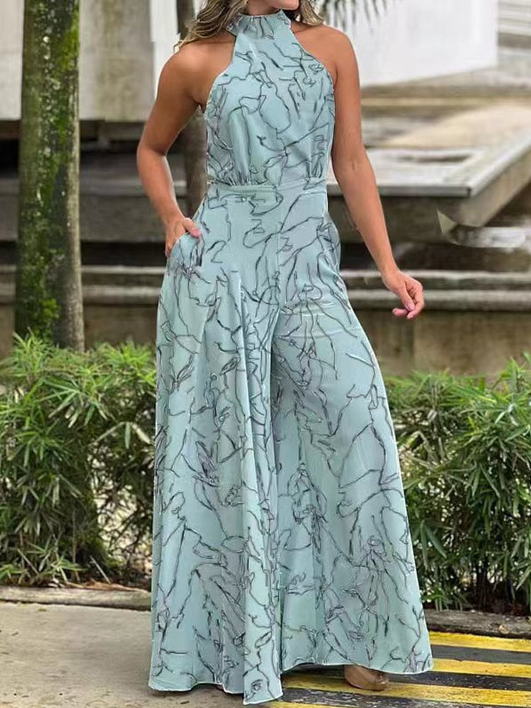 Sleeveless Hanging Neck Pants Print Jumpsuits - JELESACK